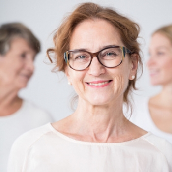 Smiling mature woman in glasses
